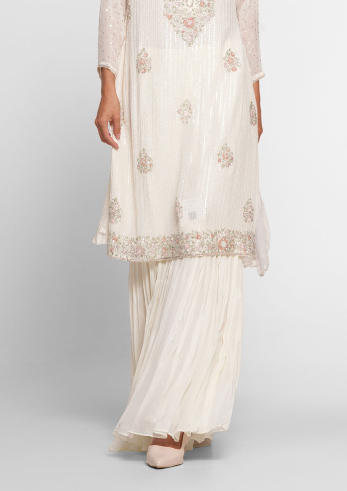 Twamev Women Cream Chinon Stitched Suit with Cutdana Work