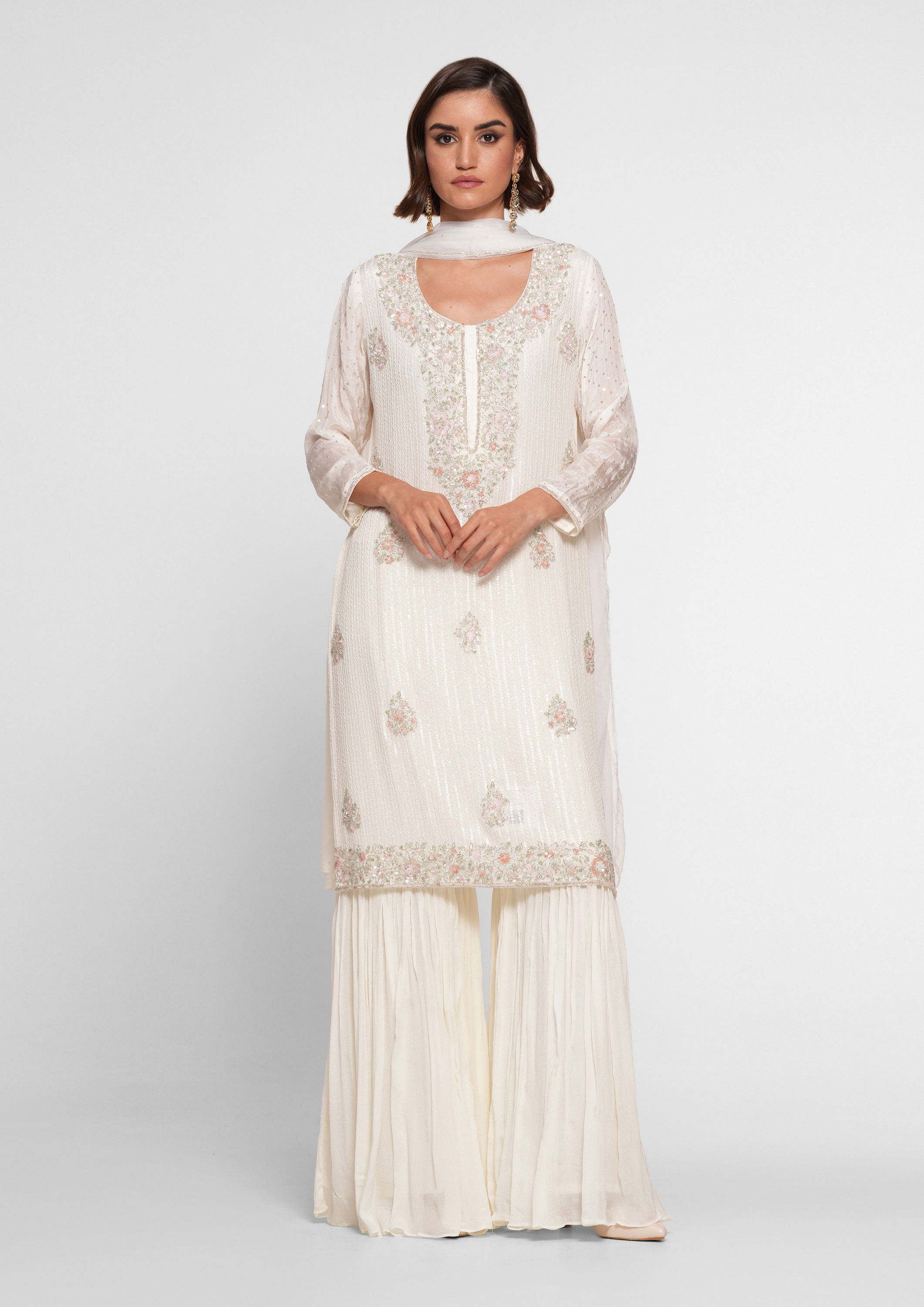 Twamev Women Cream Chinon Stitched Suit with Cutdana Work