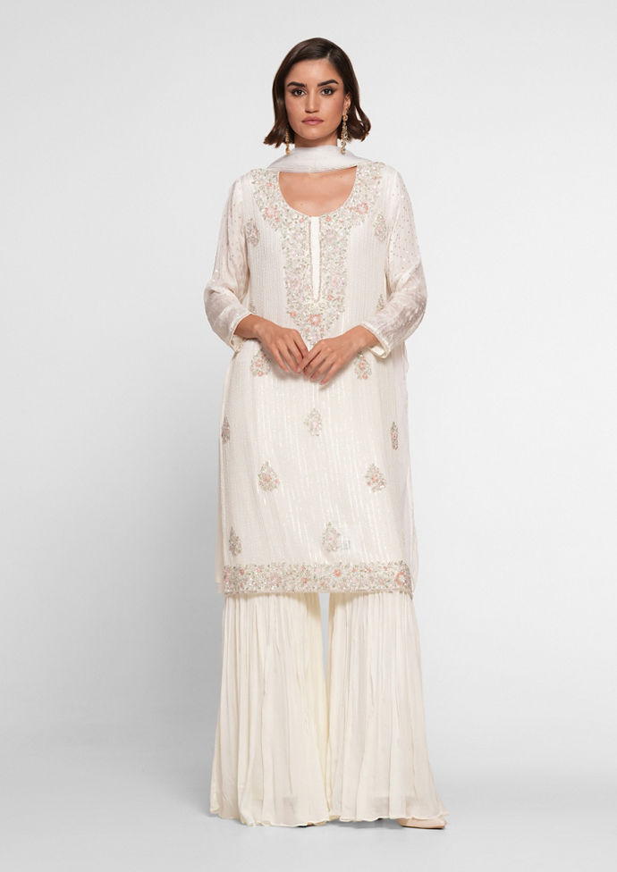 Twamev Women Cream Chinon Stitched Suit with Cutdana Work