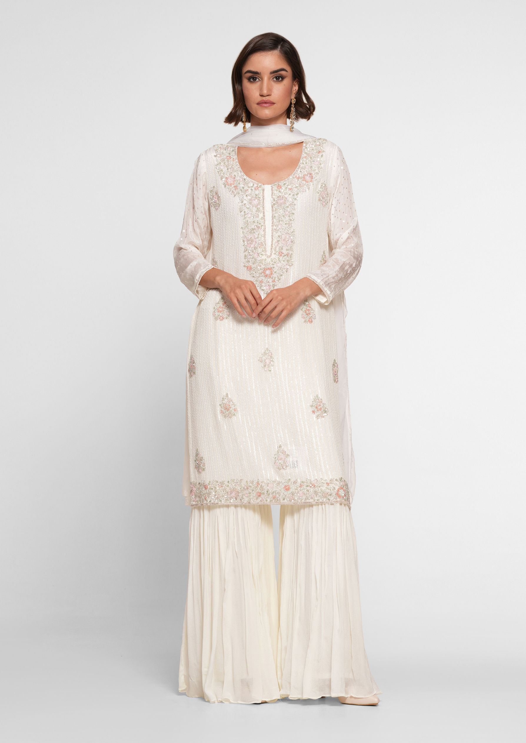 Twamev Women Cream Chinon Stitched Suit with Cutdana Work