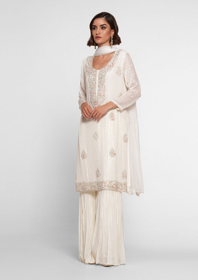 Twamev Women Cream Chinon Stitched Suit with Cutdana Work
