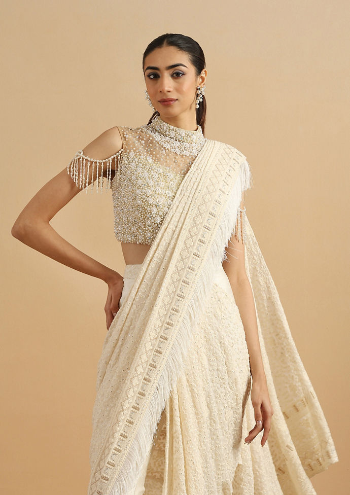 alt message - Twamev Women Regal Cream Fancy Partywear Saree image number 1