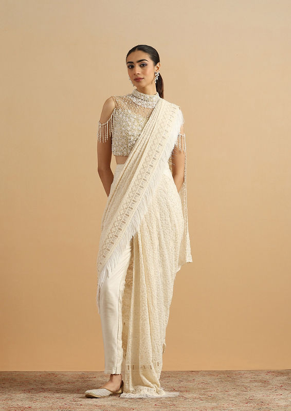 alt message - Twamev Women Regal Cream Fancy Partywear Saree image number 0