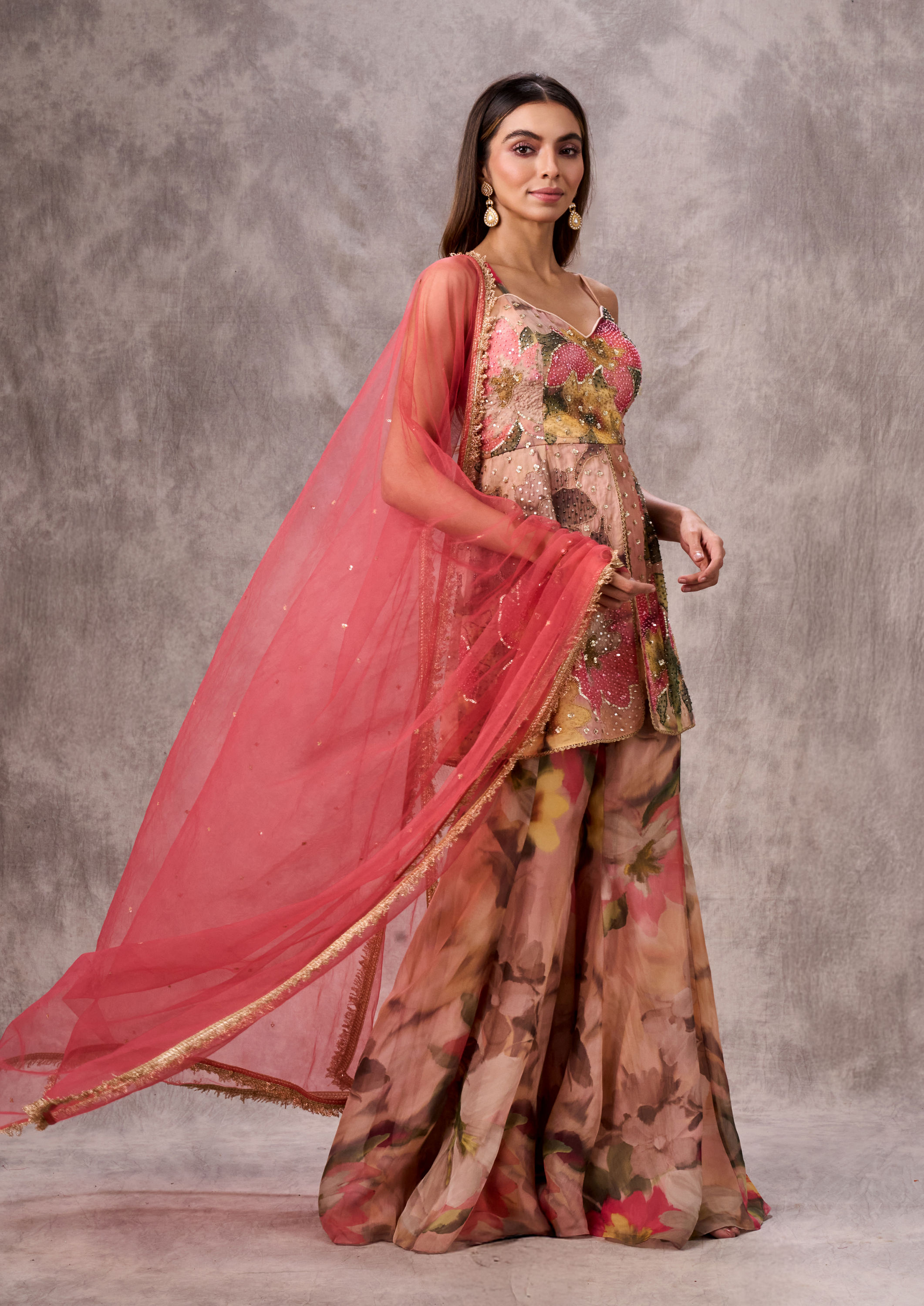 Twamev Women Peach Organza Floral Printed Embellished Peplum Sharara Suit