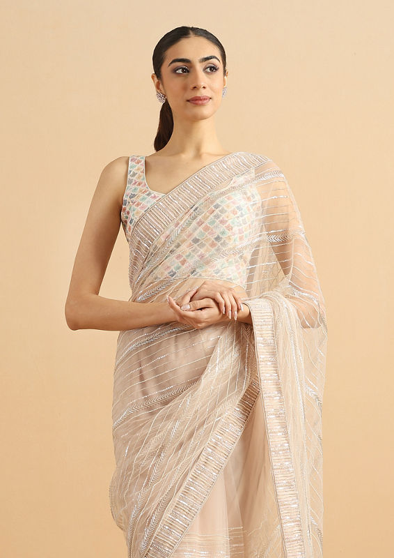 Twamev Women Sequined Shimmery Cream Saree