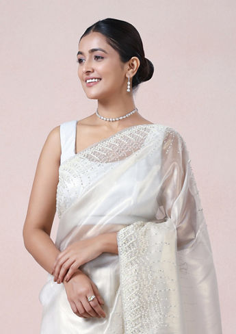 alt message - Twamev Women Creamy Sheen Organza Saree image number 1