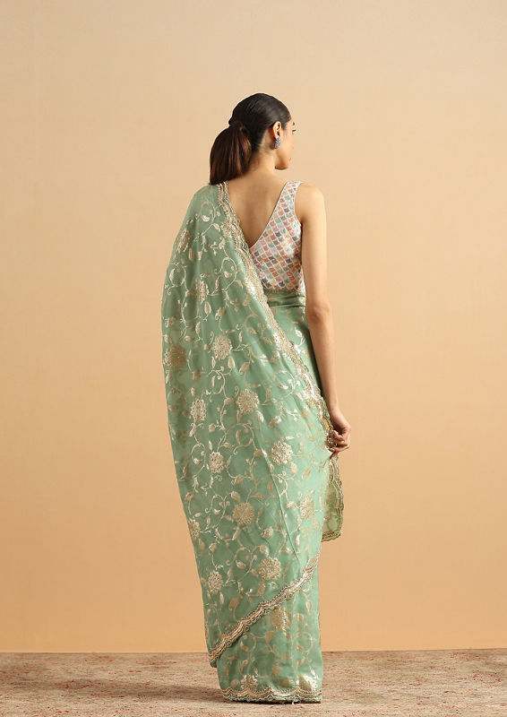 alt message - Twamev Women Whispering Pista Green Organza Saree image number 2