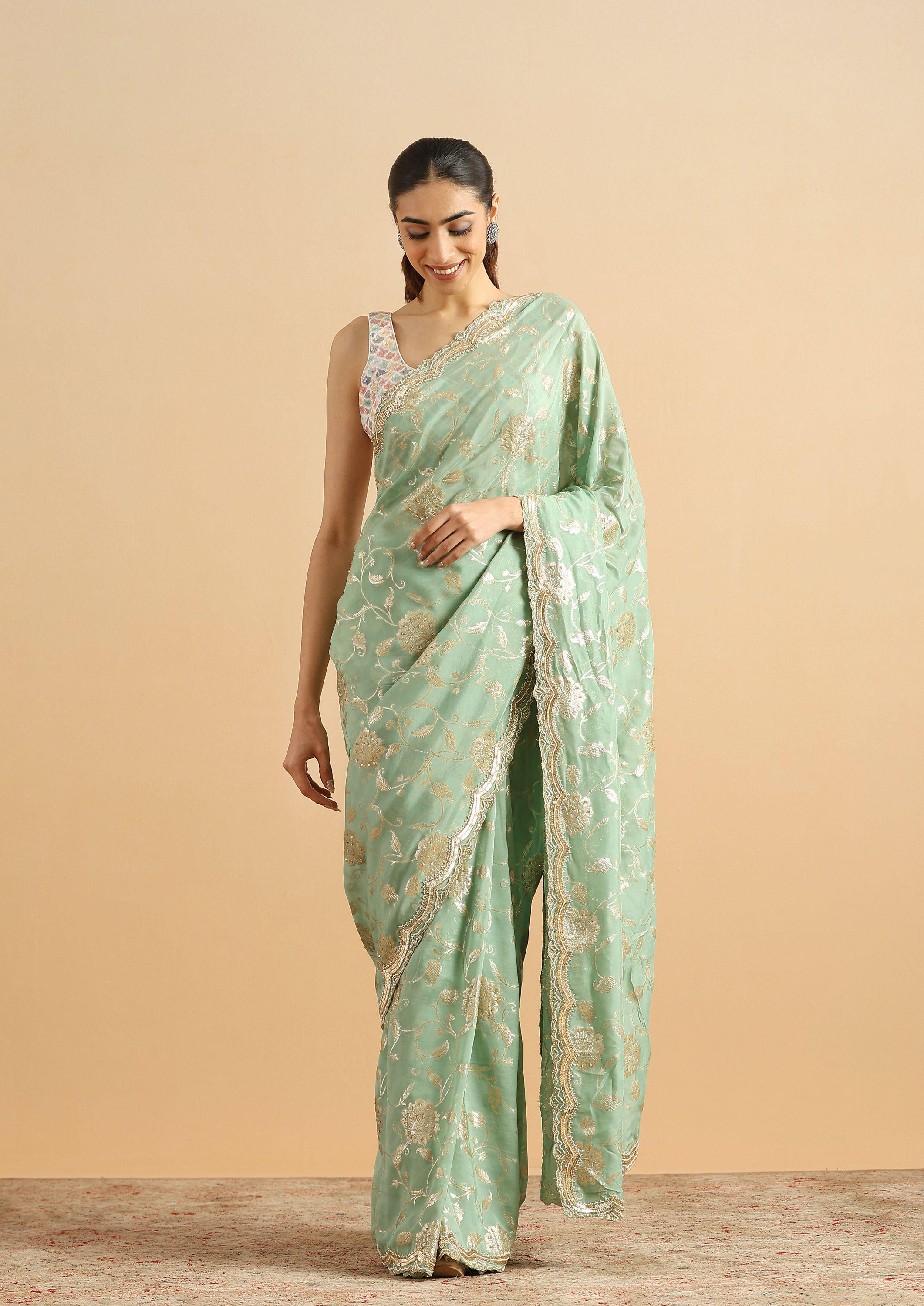 alt message - Twamev Women Whispering Pista Green Organza Saree image number 0