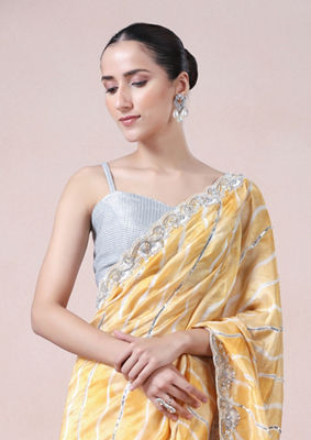 alt message - Twamev Women Modern Yellow Leheriya Inspired Saree image number 1