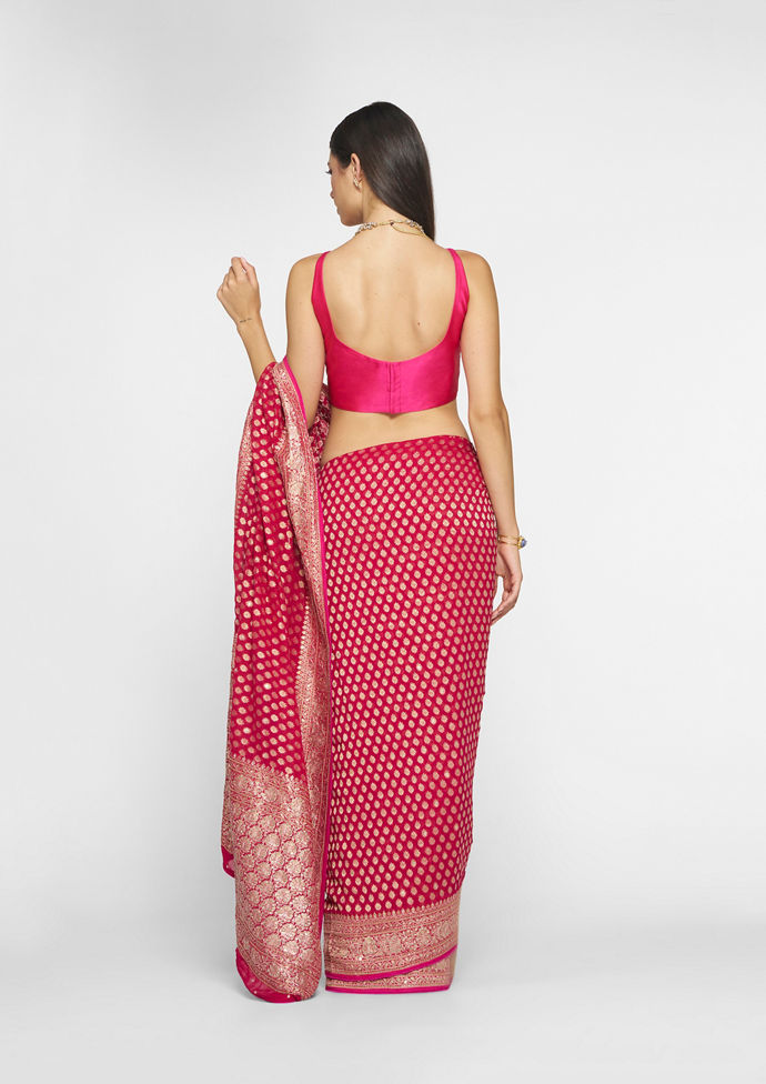 Twamev Women Ravishing Rani Georgette Saree