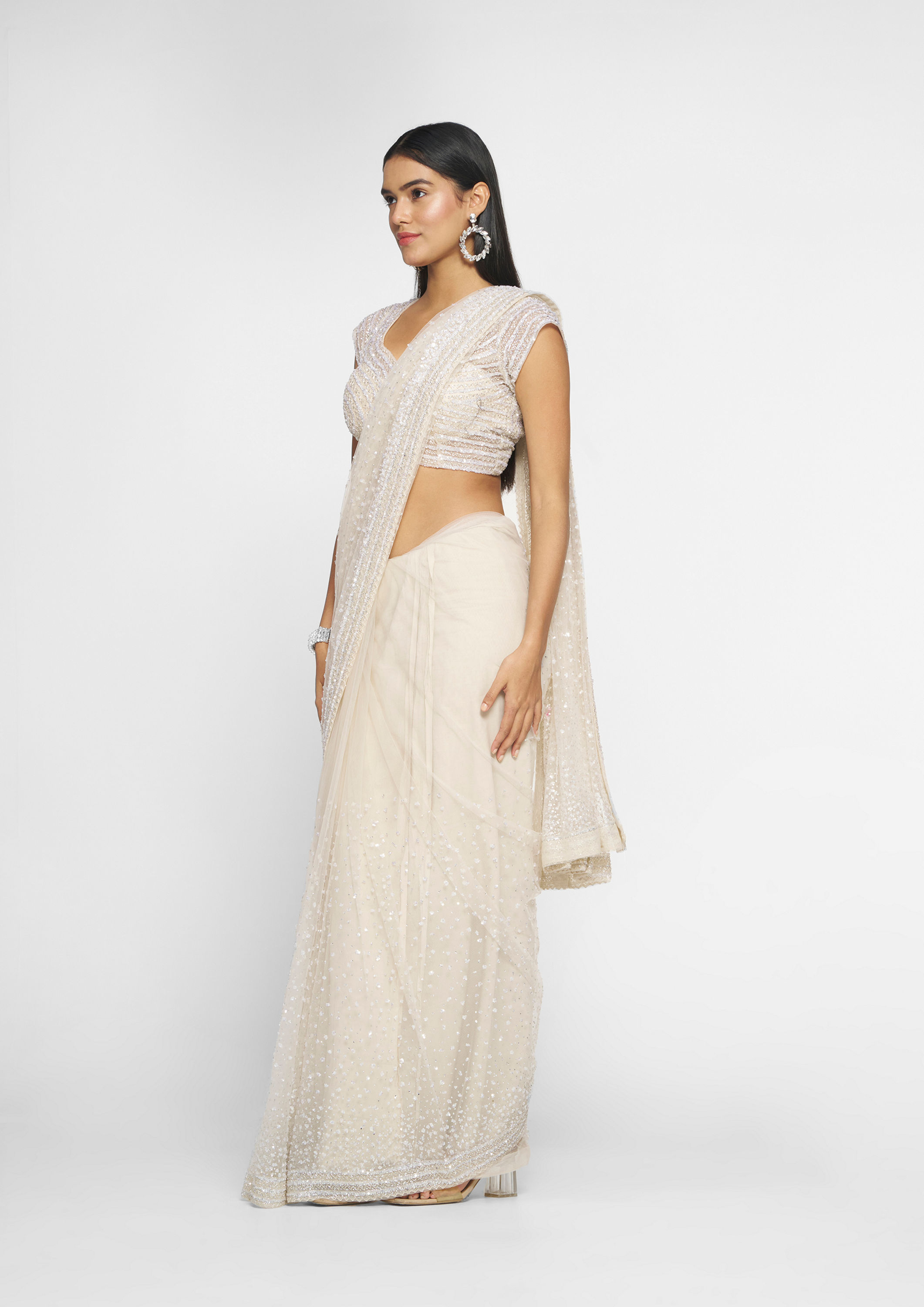 alt message - Twamev Women Cream Radiance Net Saree image number 2