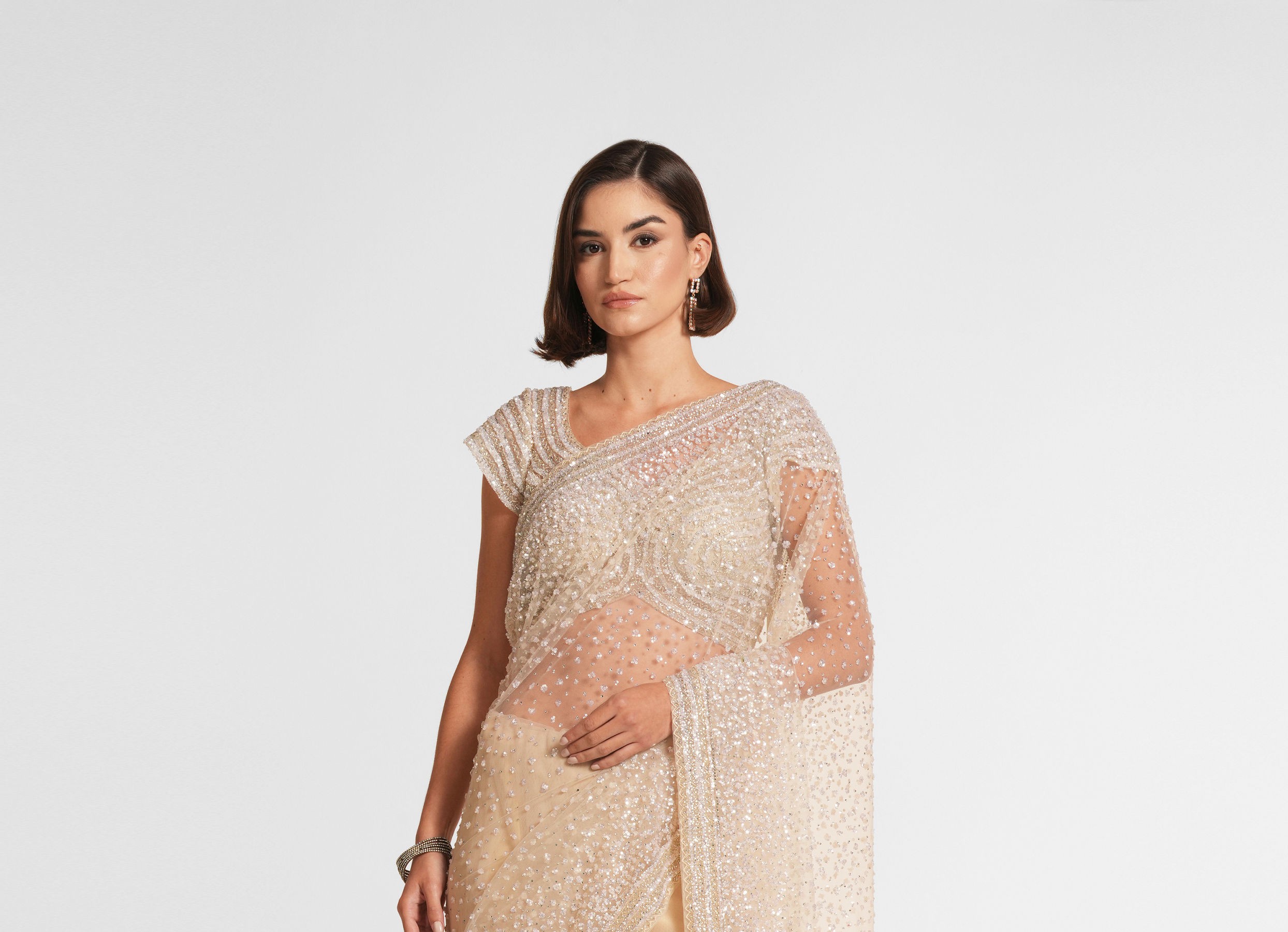 Twamev Women Cream Radiance Net Saree