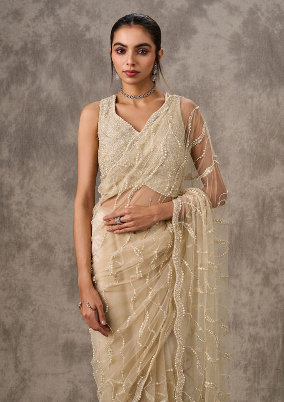 Twamev Women Cream Net Elegance Saree