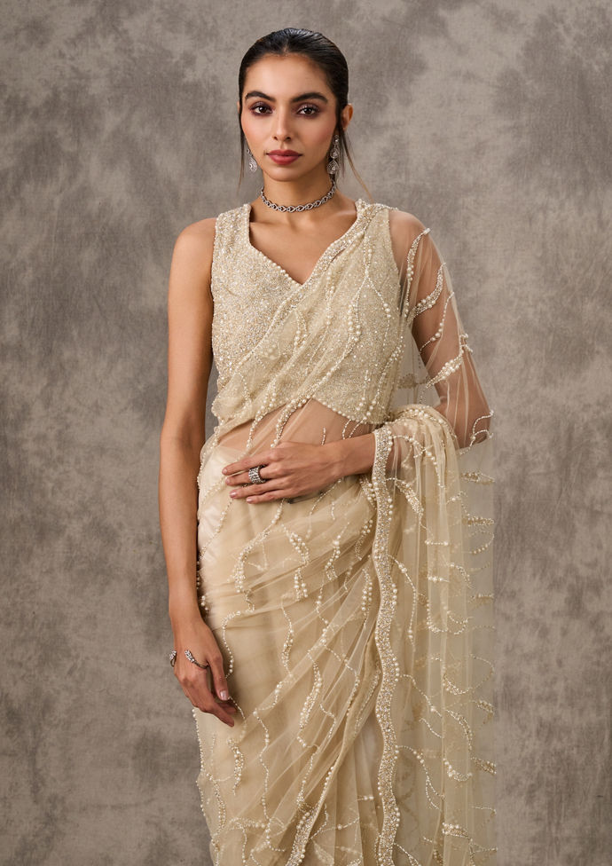 Twamev Women Cream Net Elegance Saree