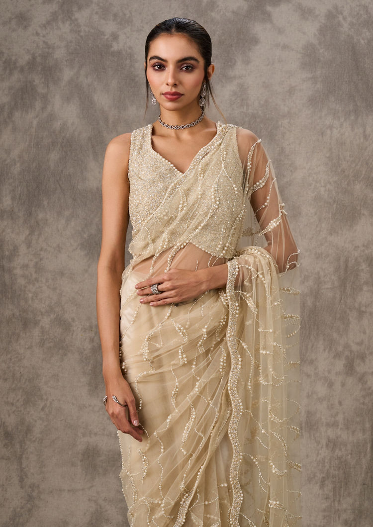 Twamev Women Cream Net Elegance Saree