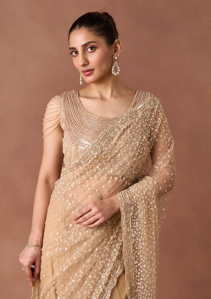 Twamev Women Beige Net Saree with Pearl Beadwork