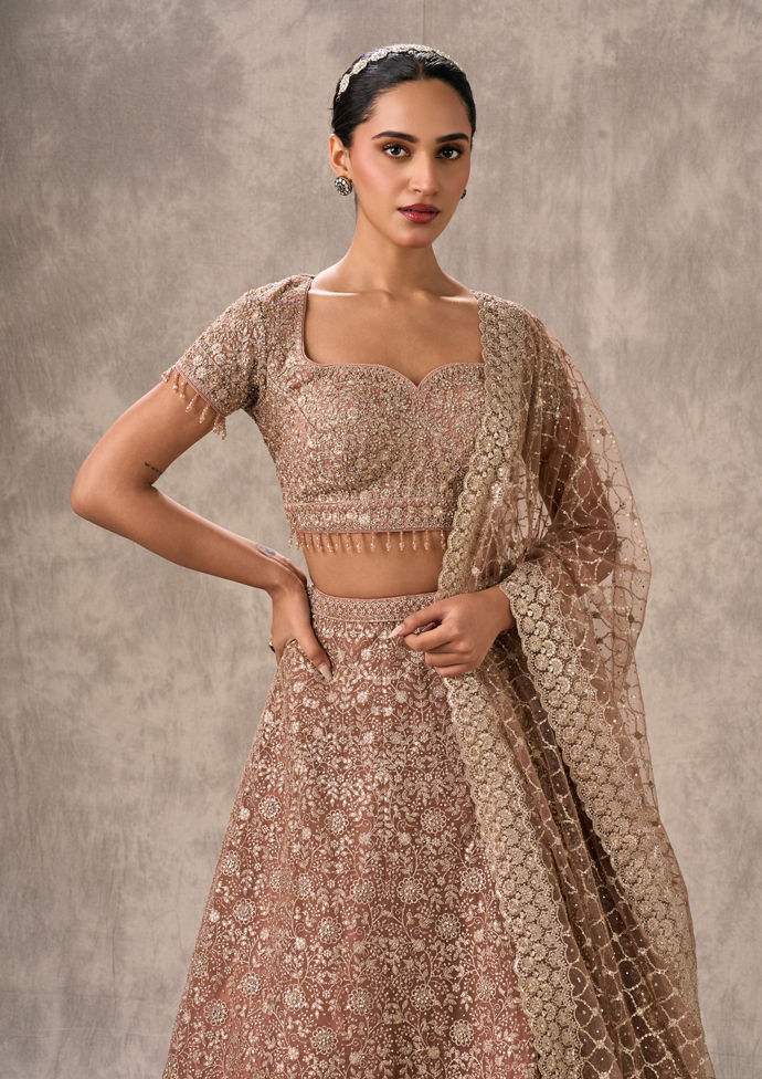 Twamev Women Peach Net Heavy Embroidered Sweetheart Lehenga