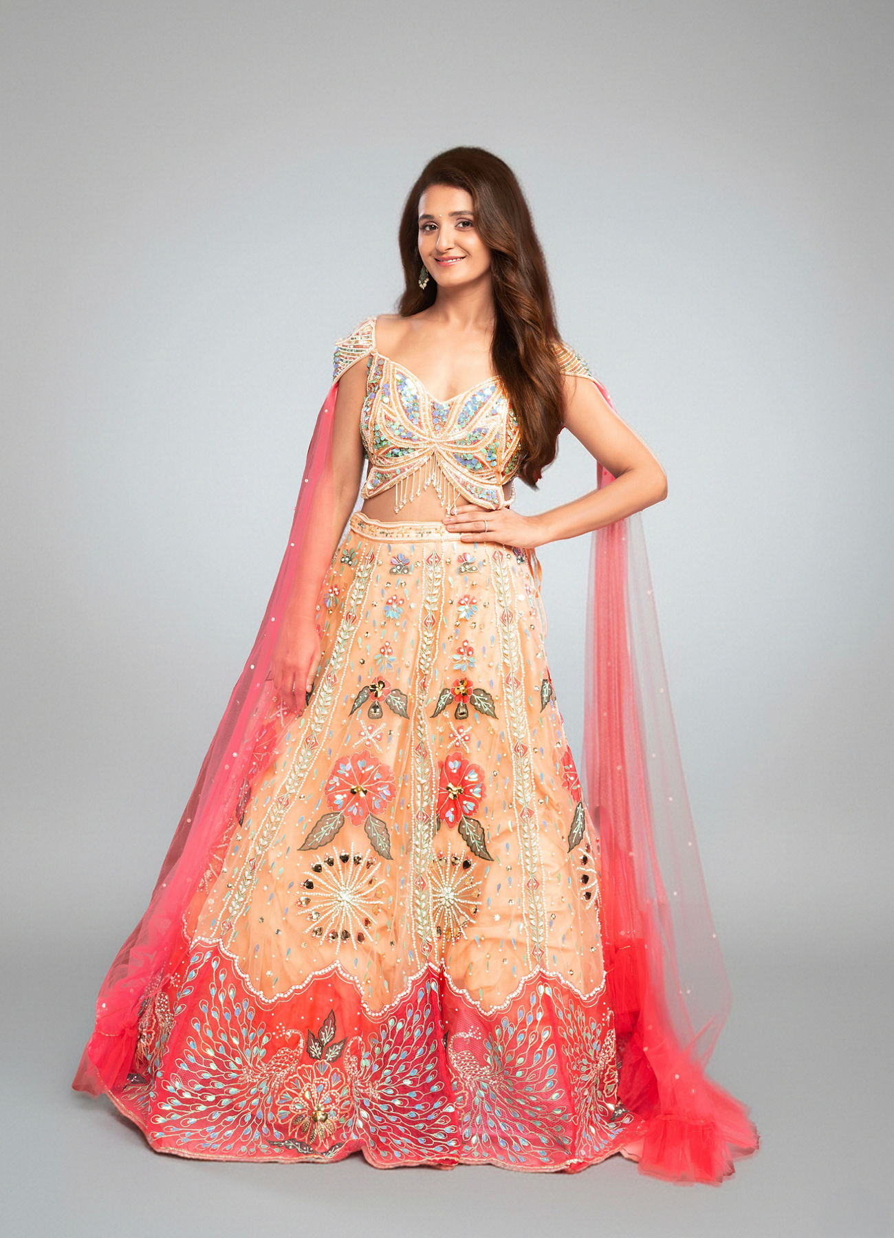 Twamev Women Peach Net Hand Embroidered Off-Shoulder Lehenga