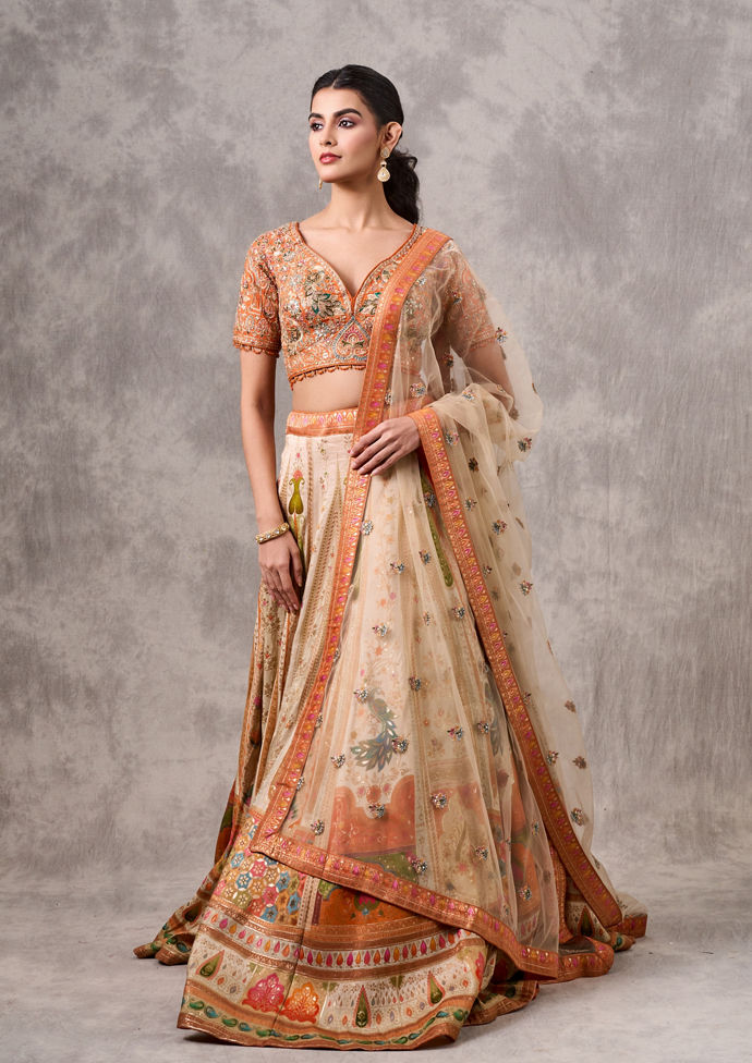 Twamev Women Cream-Orange Lehenga Extravaganza
