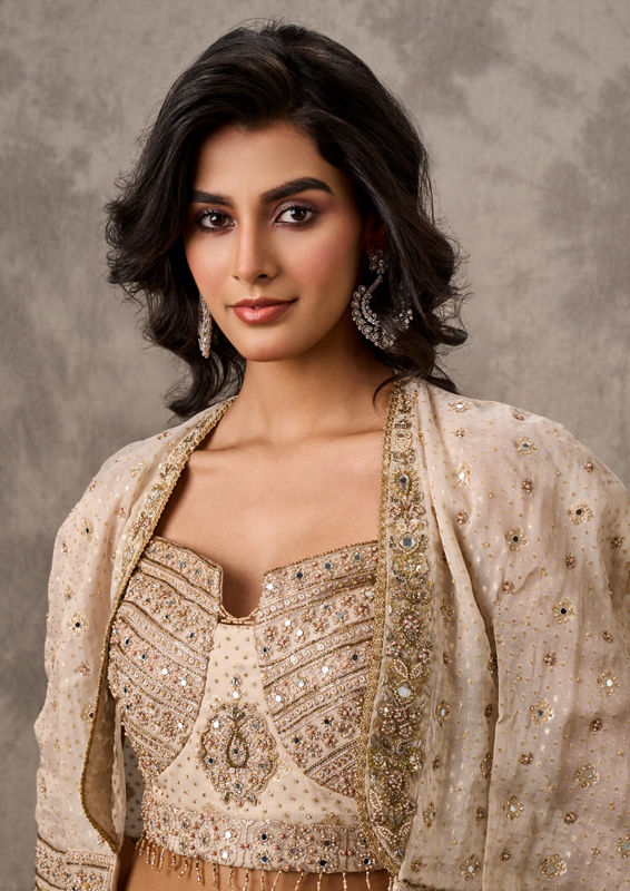 Twamev Women Cape Style Cream Lehenga Ensemble