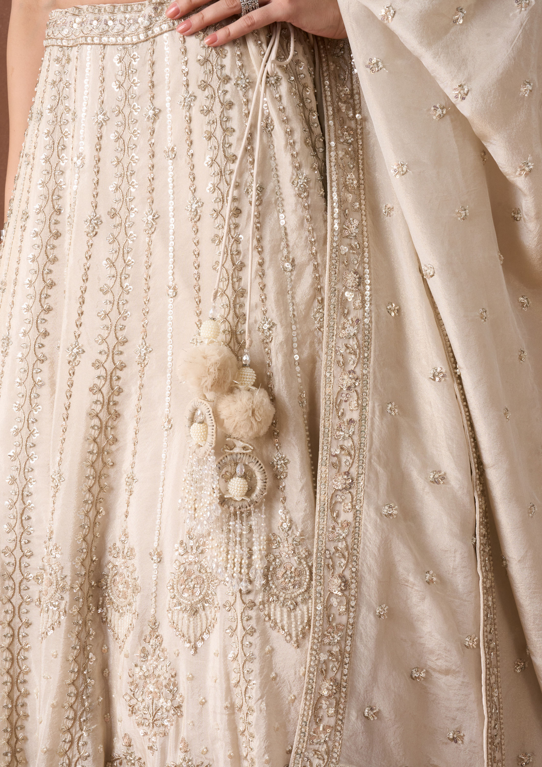 Twamev Women Cream Beaded Texture Lehenga