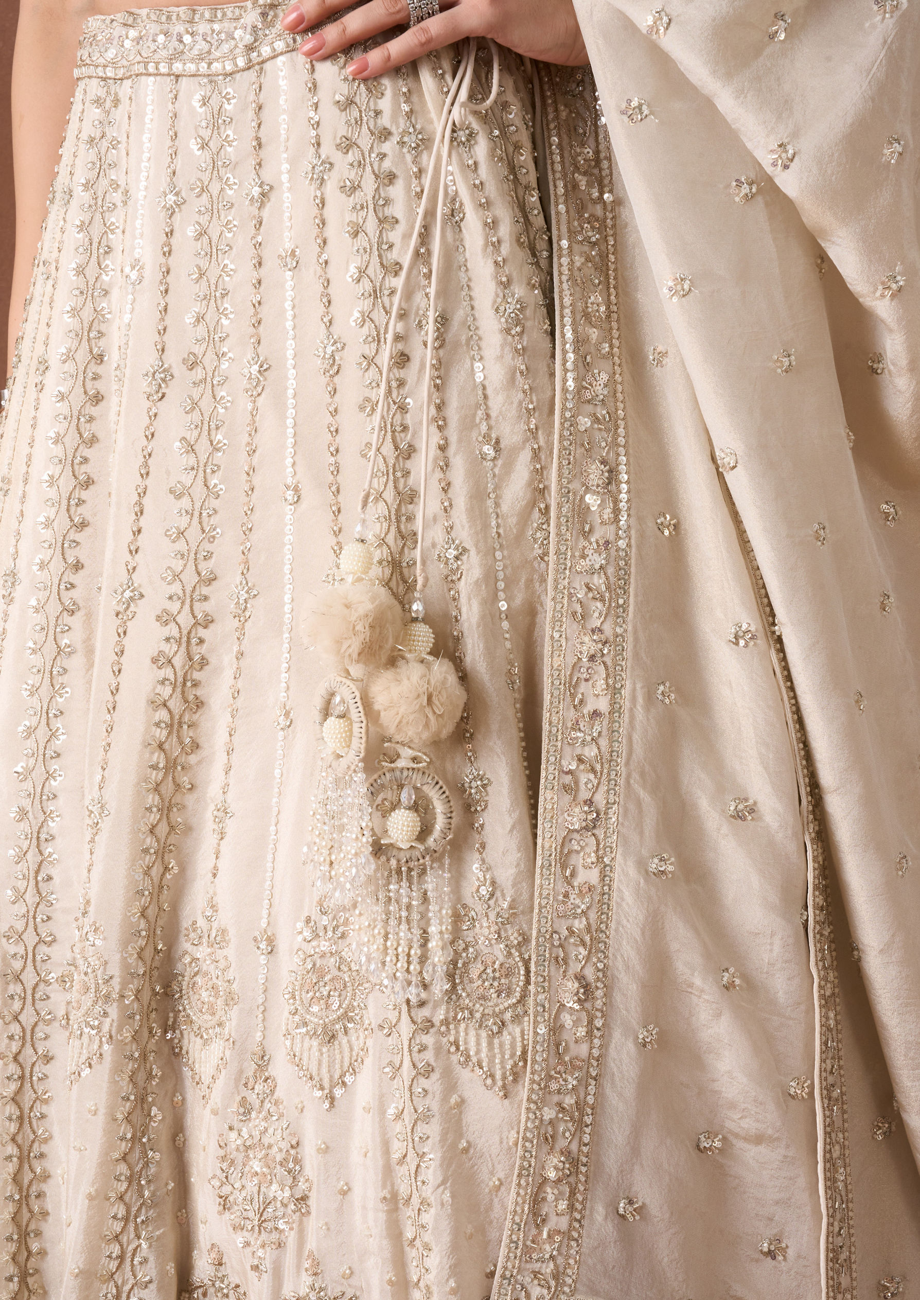 Twamev Women Cream Beaded Texture Lehenga