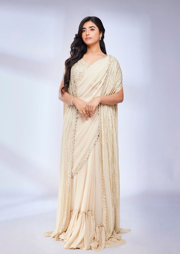 alt message - Twamev Women Dark Cream Scallop Bordered Draped Saree with Cape image number 0