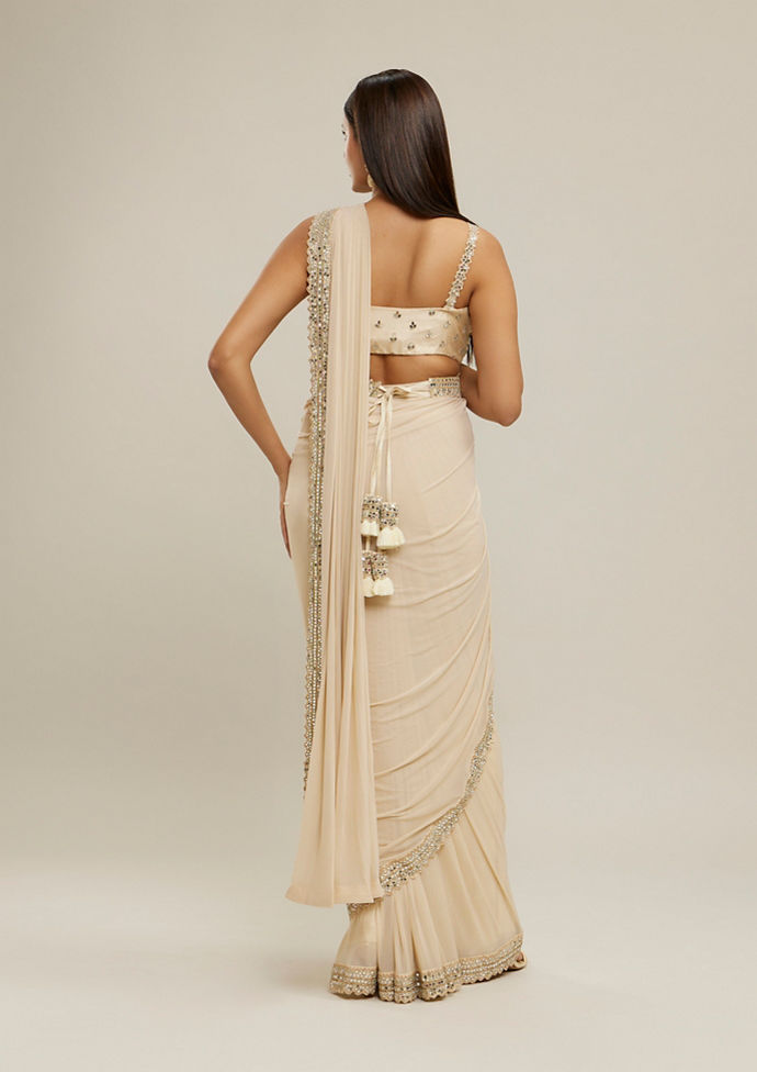Twamev Women Cream Glimmering Knitted Saree Set