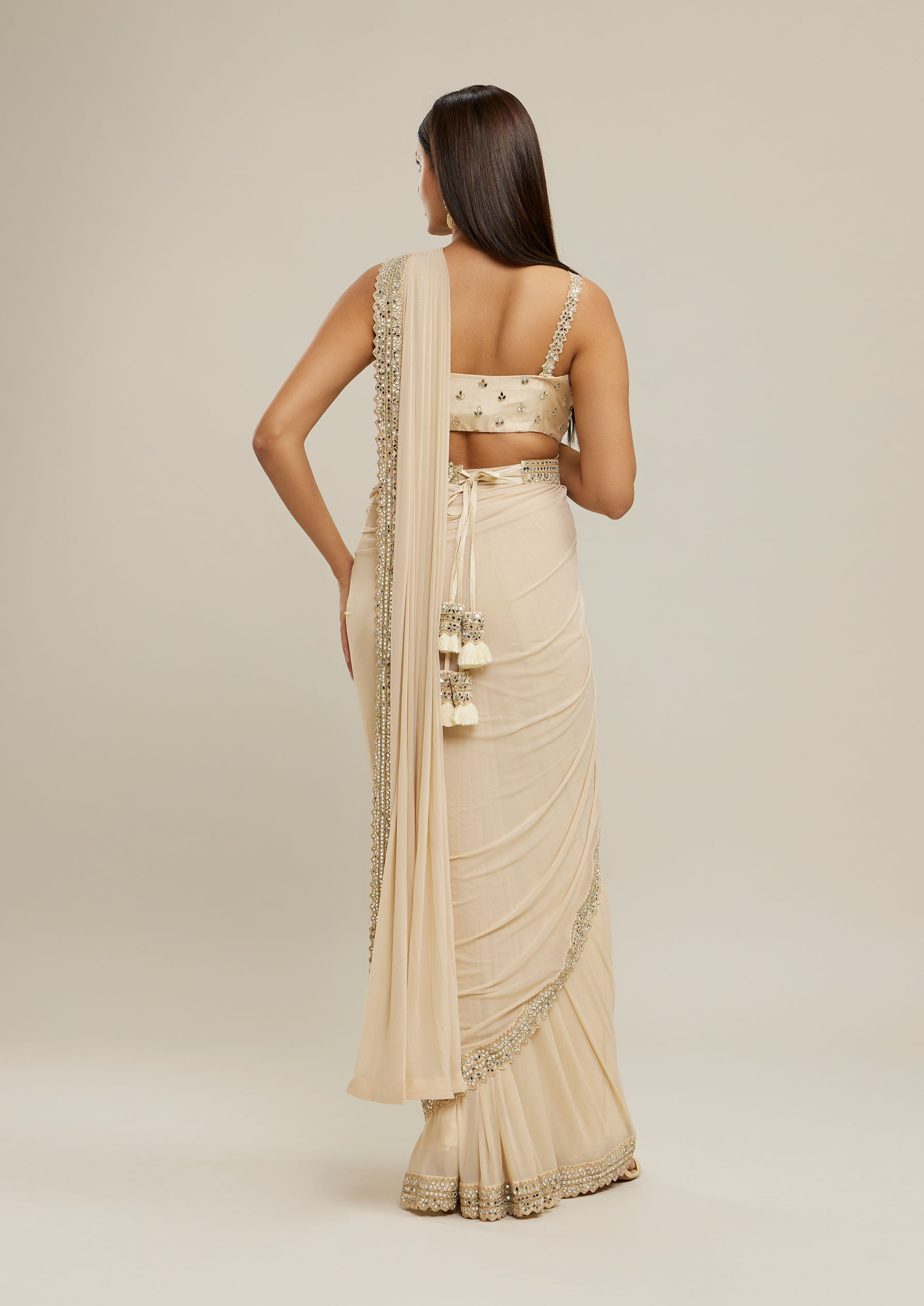 Twamev Women Cream Glimmering Knitted Saree Set