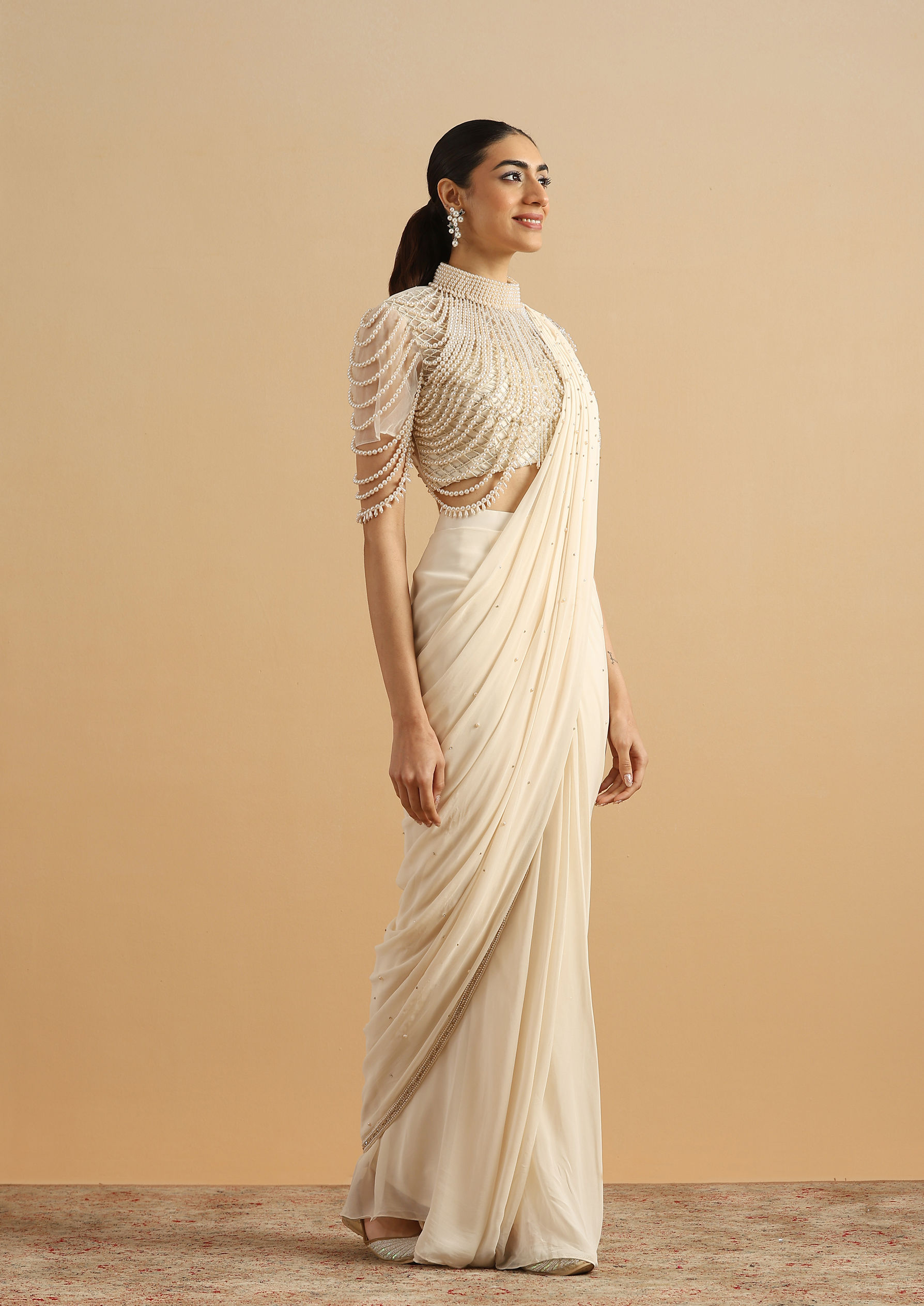 Twamev Women Cream Pearl Dream Party Saree