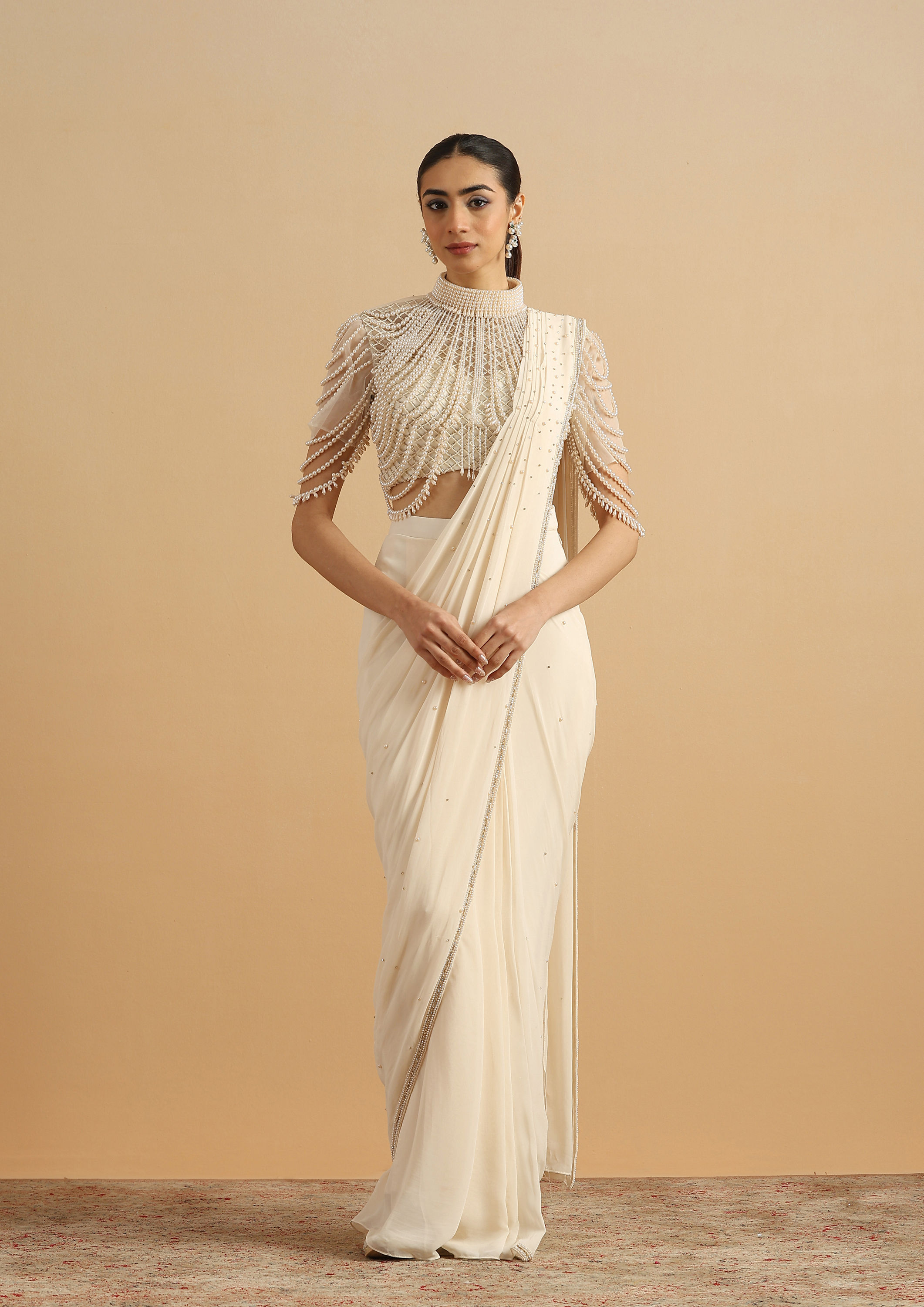 alt message - Twamev Women Cream Pearl Dream Party Saree image number 0