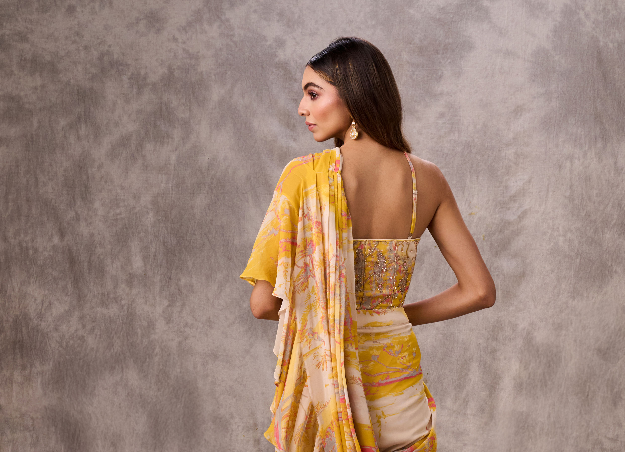 Twamev Women Yellow & Pink Georgette Floral Printed Ruffle Corset Draped Saree