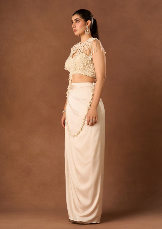 Twamev Women Cream Chinon Saree with Pearl Detail