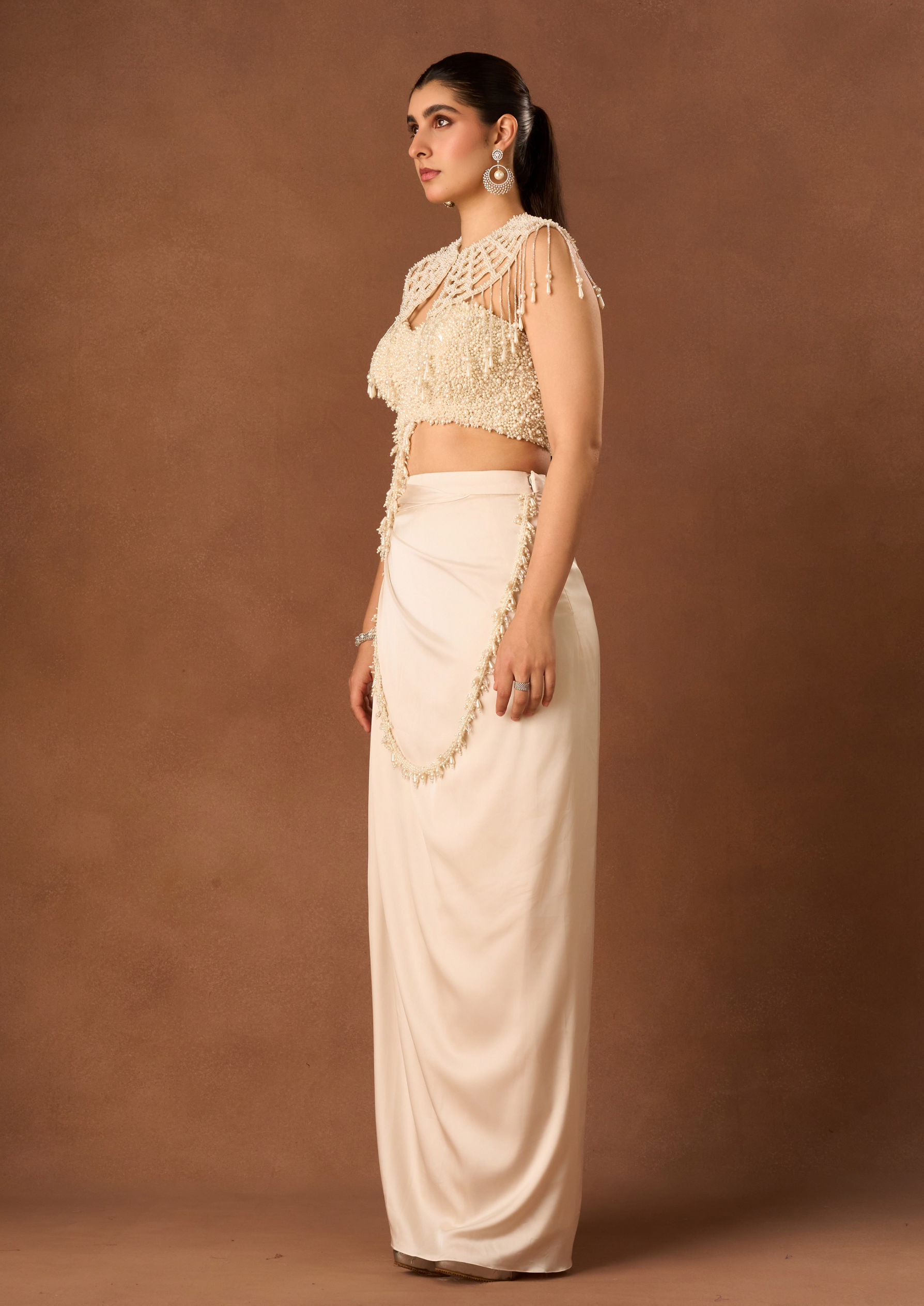 Twamev Women Cream Chinon Saree with Pearl Detail
