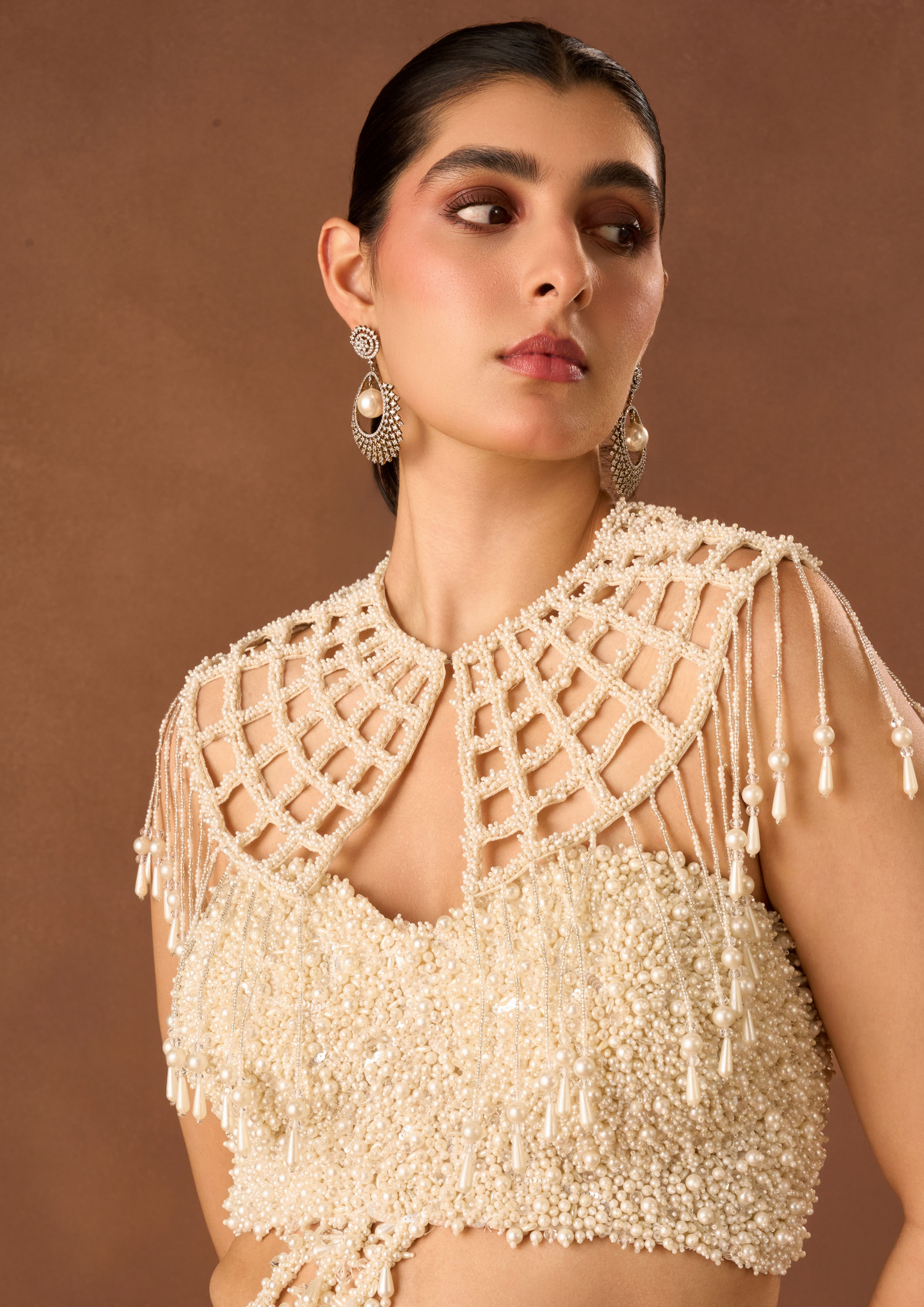 Twamev Women Cream Chinon Saree with Pearl Detail