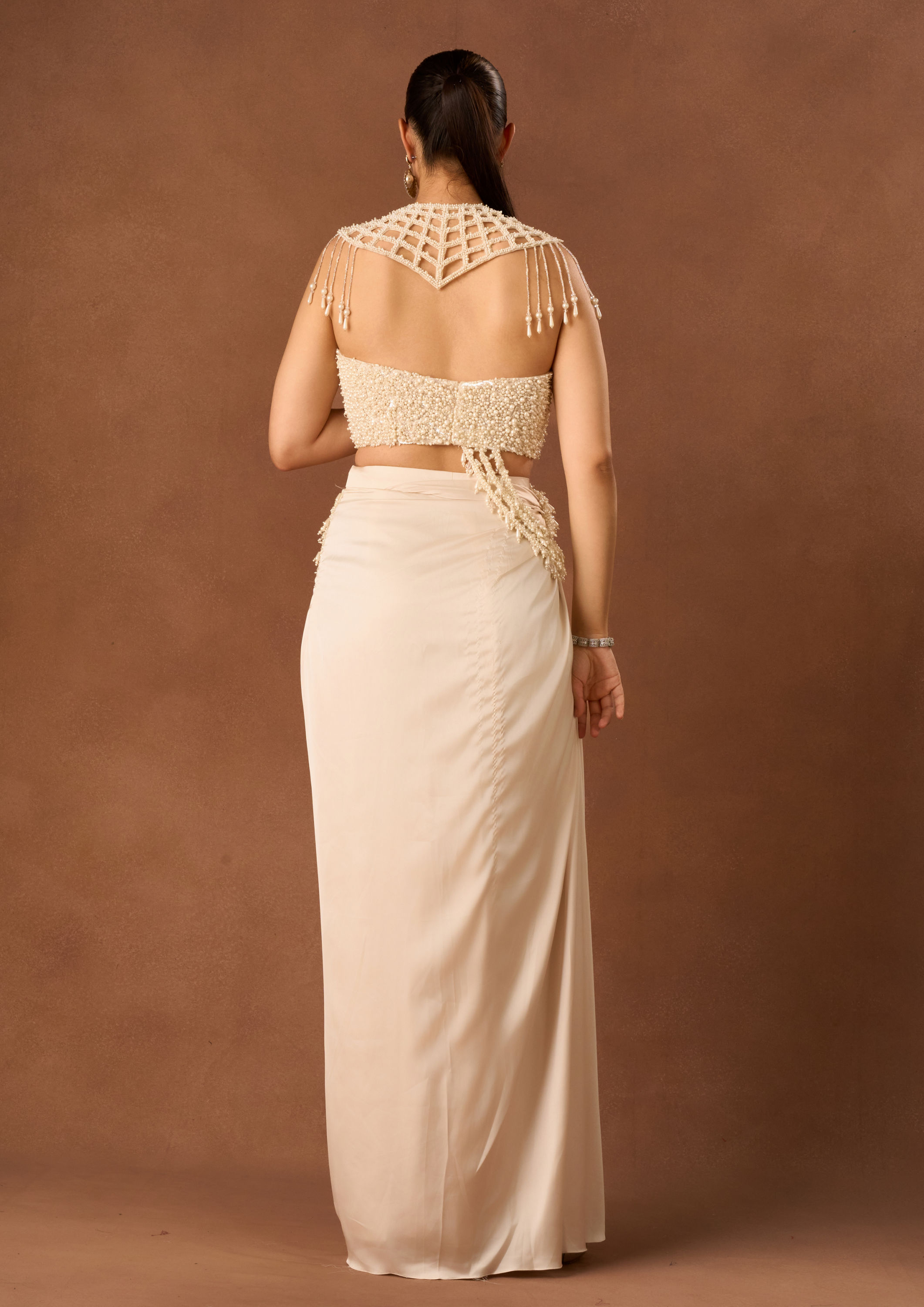 Twamev Women Cream Chinon Saree with Pearl Detail