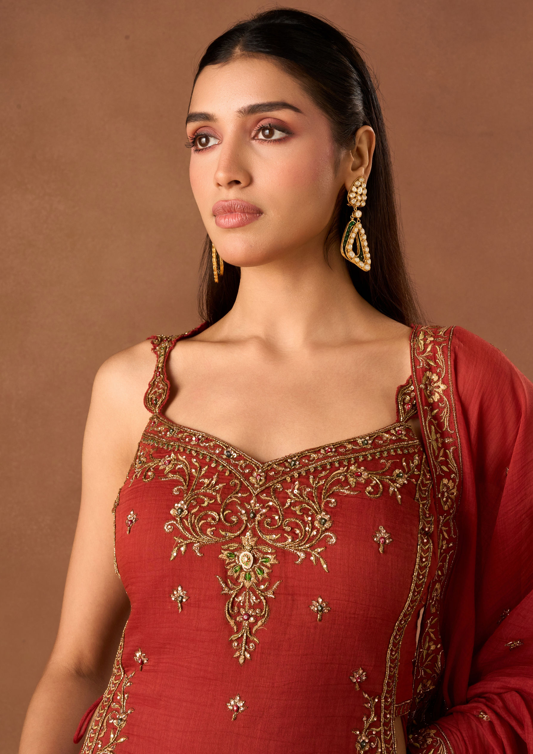Twamev Women Red Knit Saree with Embroidery and Cutdana Work