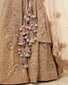 Mohey Women Purple Floral Embroidered Bridal Lehenga