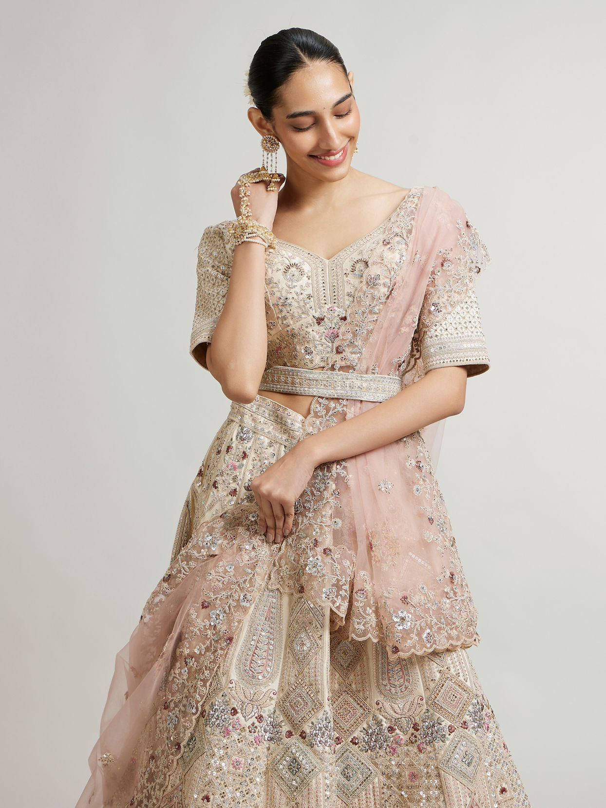 Mohey Women Dark Cream Lehenga with Motifs, Beads And Sequin Work