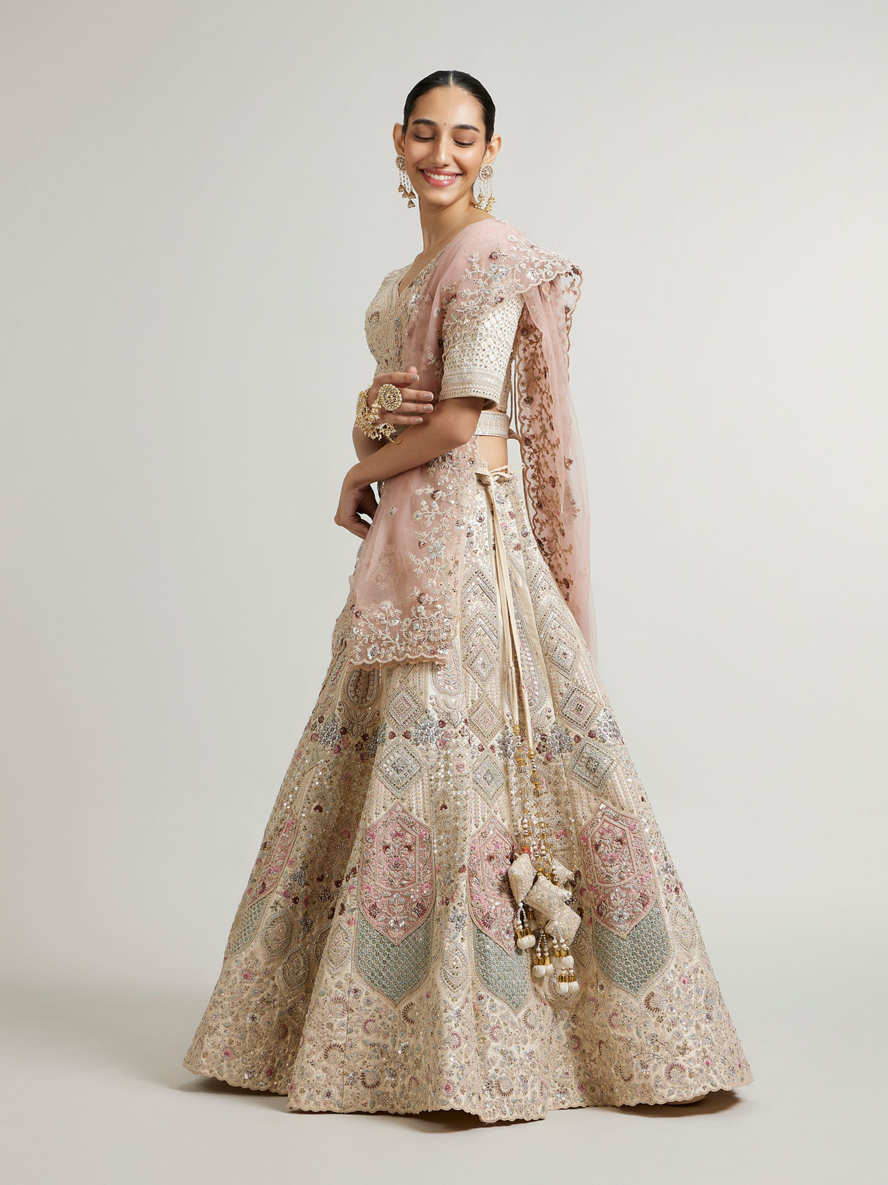 Mohey Women Dark Cream Lehenga with Motifs, Beads And Sequin Work