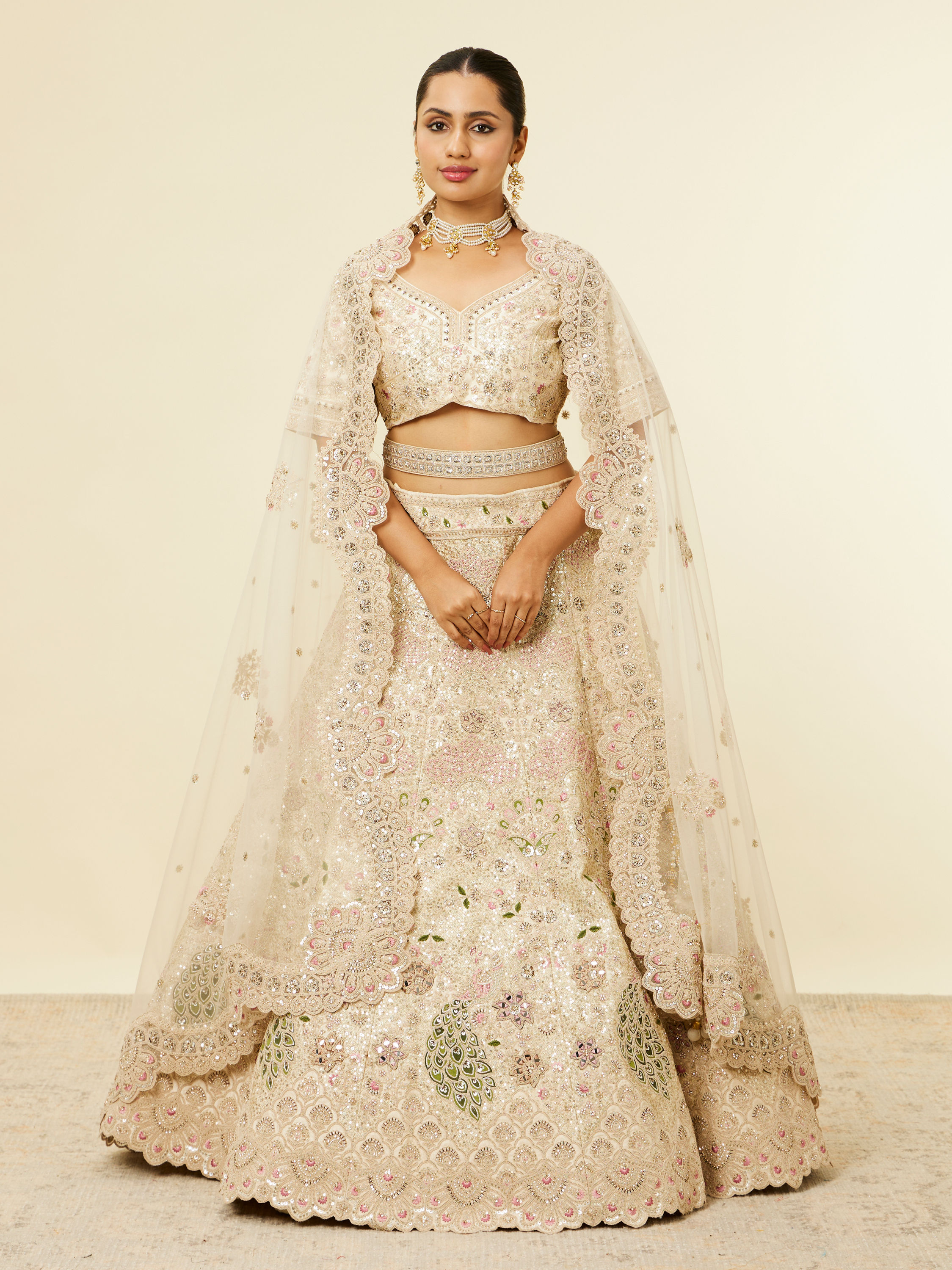 Mohey Women Dark Cream Floral Patterned Bridal Lehenga with Peacock Motifs