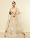 Mohey Women Dark Cream Floral Patterned Bridal Lehenga with Peacock Motifs