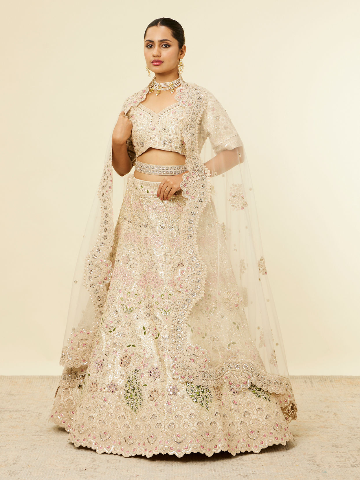 Mohey Women Dark Cream Floral Patterned Bridal Lehenga with Peacock Motifs