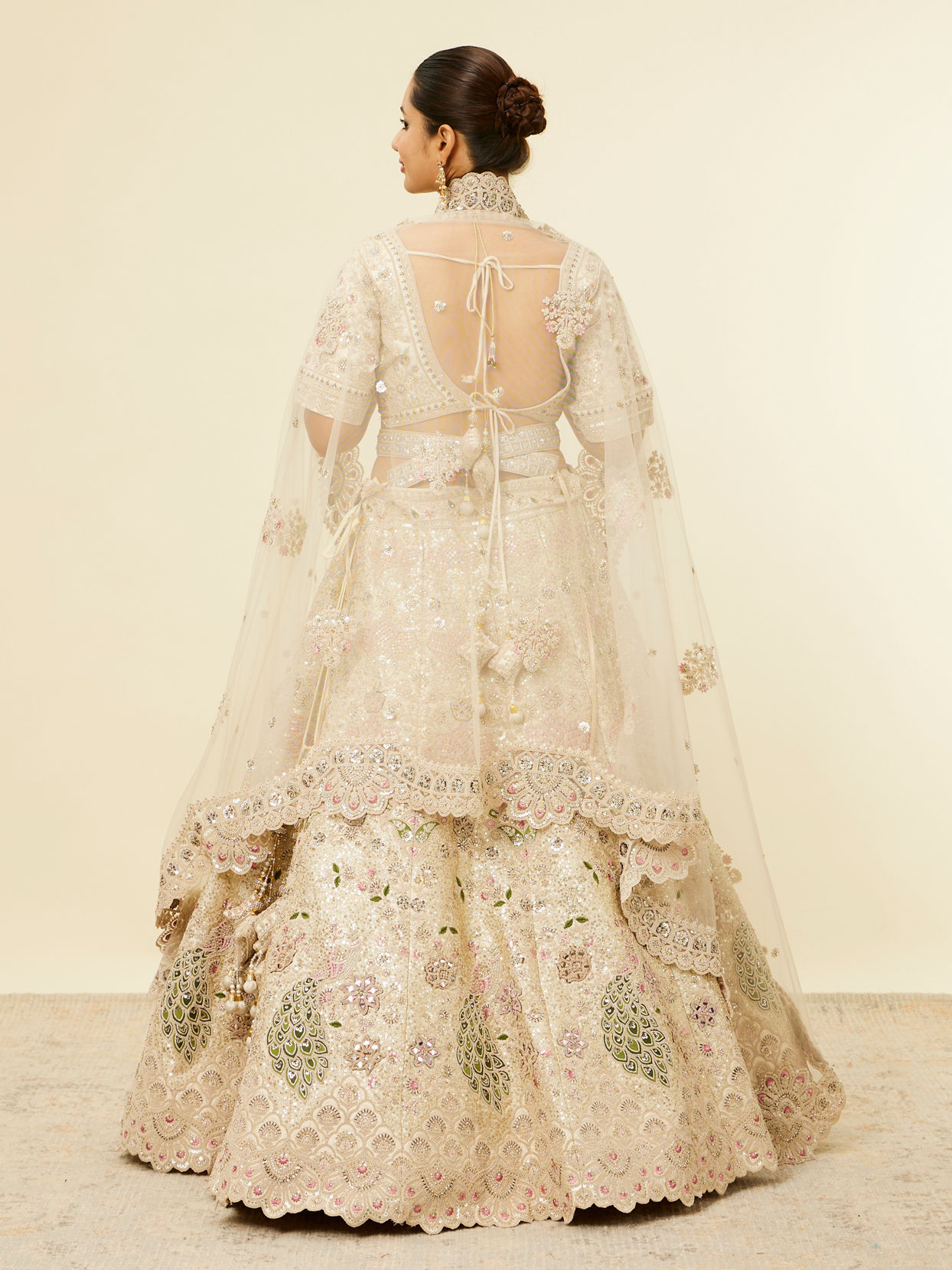 Mohey Women Dark Cream Floral Patterned Bridal Lehenga with Peacock Motifs