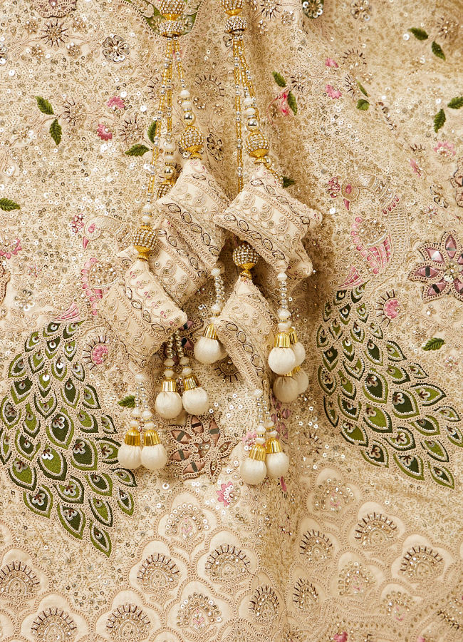 Mohey Women Dark Cream Floral Patterned Bridal Lehenga with Peacock Motifs