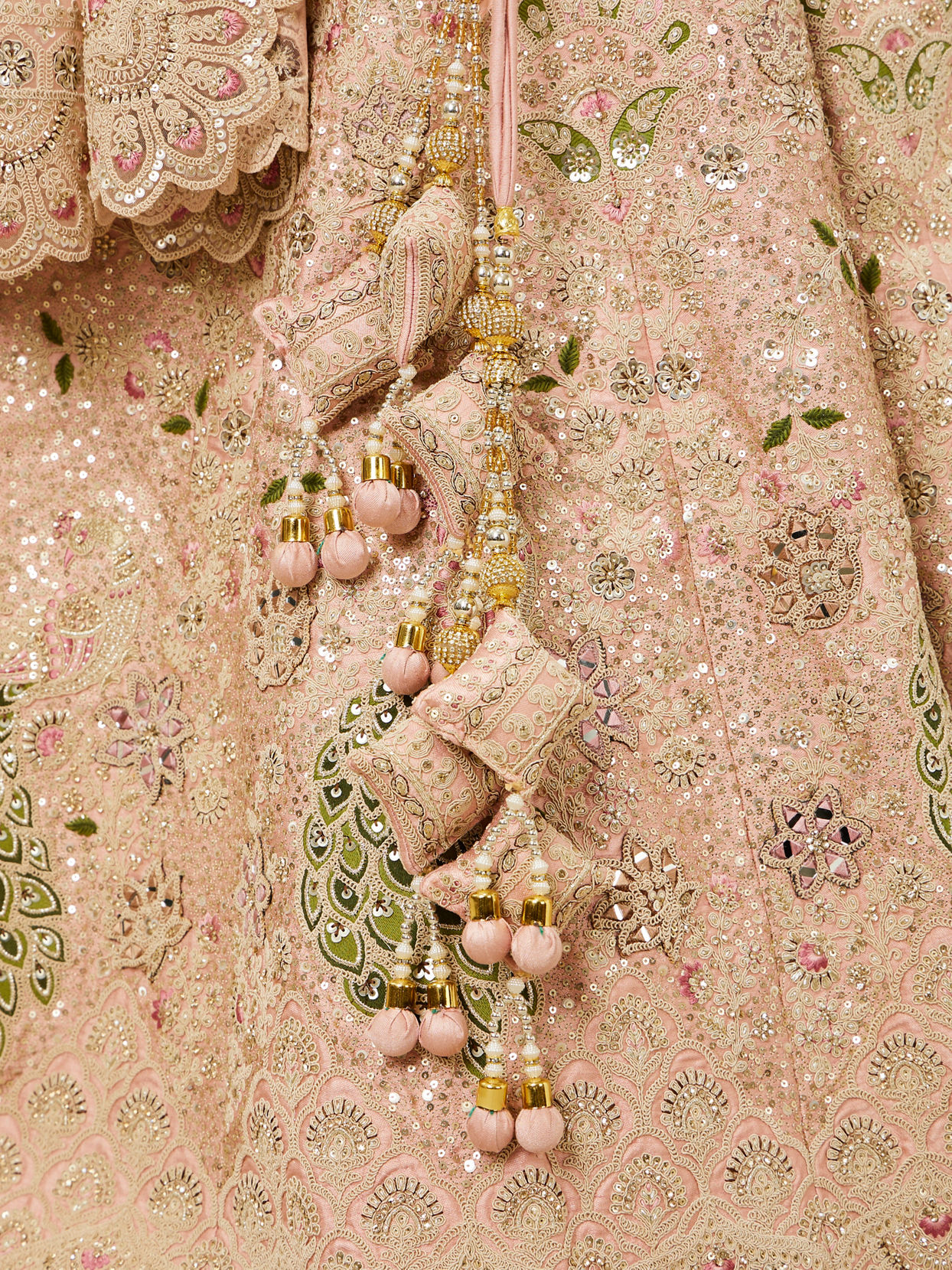 alt message - Mohey Women Golden Pink Sitara Embroidered Lehenga with Peacock Motifs image number 3