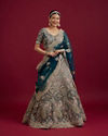 Mohey Women Teal Blue Sequinned Lehenga with Jaal Pattern and Peacock Motifs image number 0