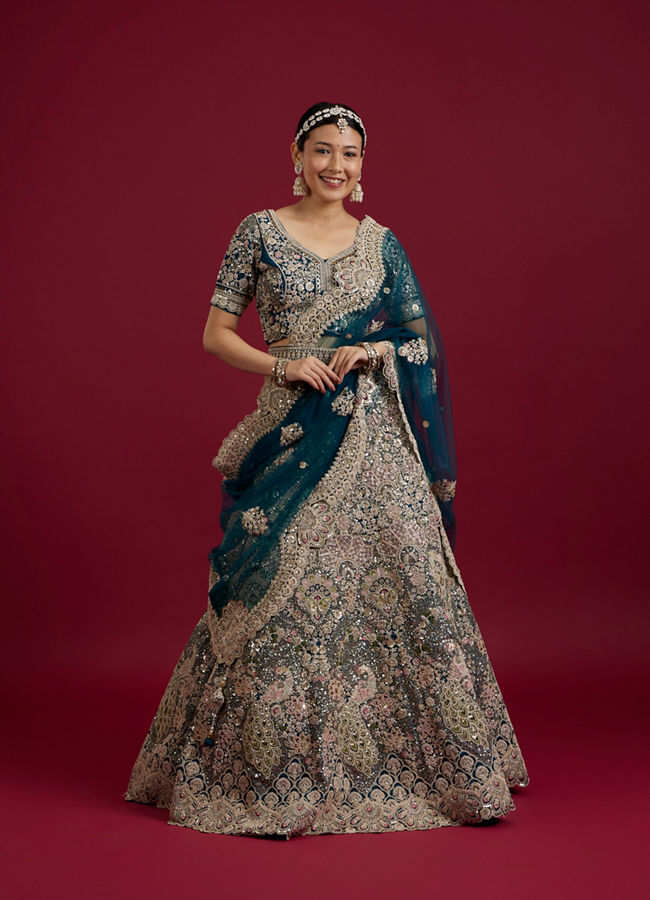 Mohey Women Teal Blue Sequinned Lehenga with Jaal Pattern and Peacock Motifs image number 0