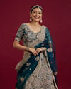 Mohey Women Teal Blue Sequinned Lehenga with Jaal Pattern And Peacock Motifs