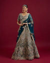 Mohey Women Teal Blue Sequinned Lehenga with Jaal Pattern And Peacock Motifs